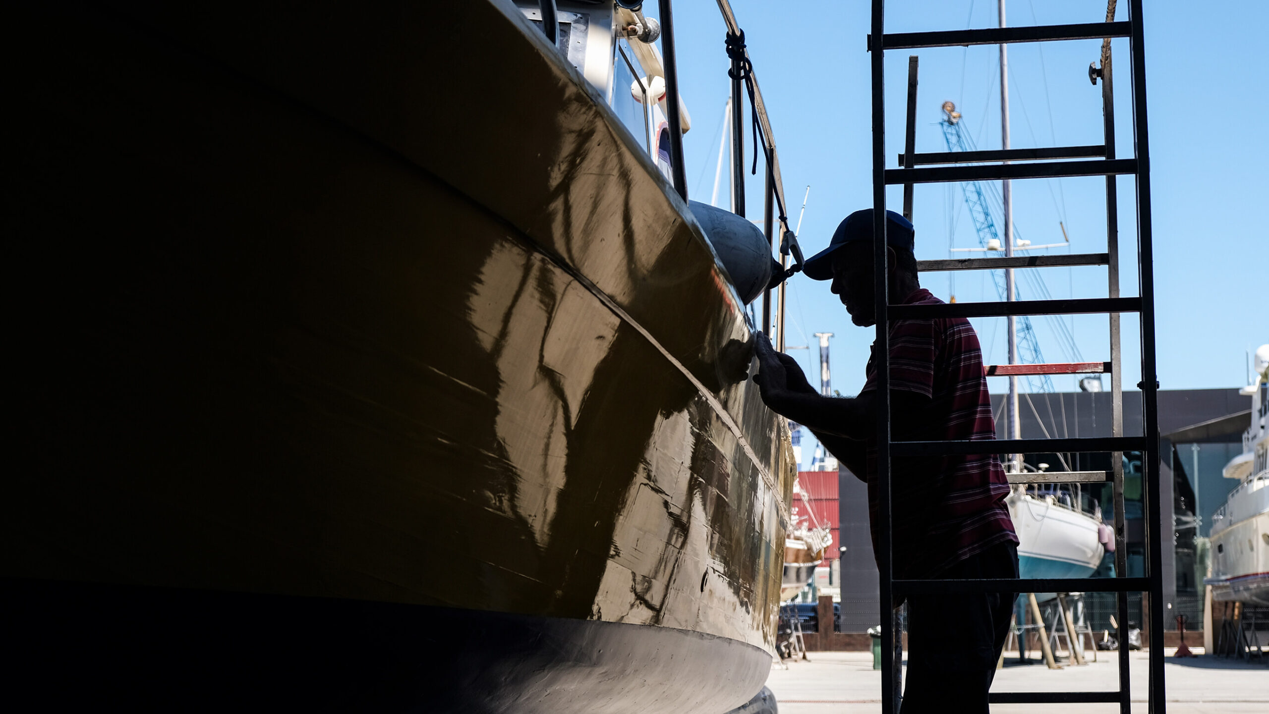 Man repairing boat